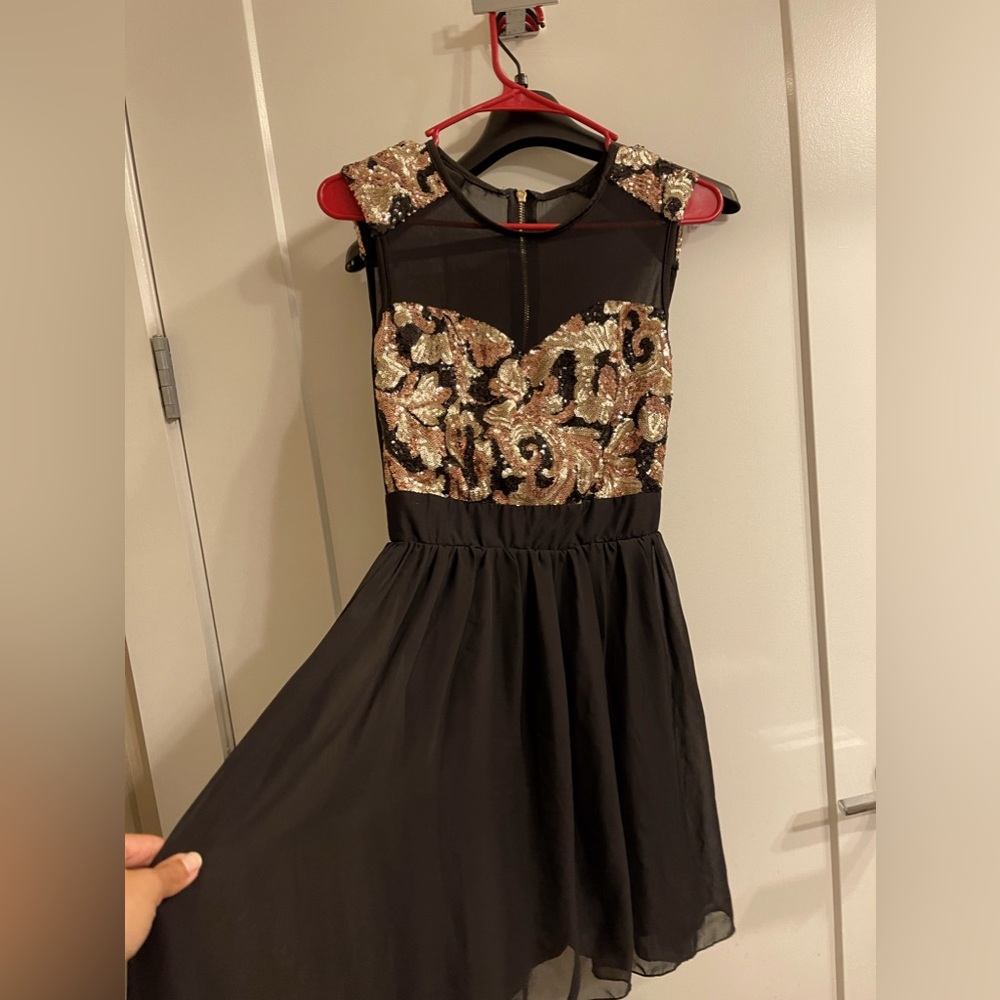 Sequined fit and flare mini black dress